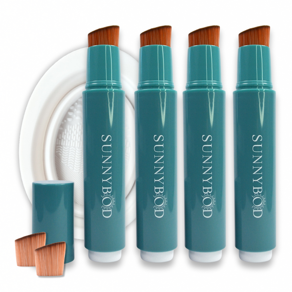The Sun Seeker Family Bundle. The picture shows four SUNNYBOD™ Refillable Sunscreen Applicator side by side. The brush is turquoise. The handle has the word "SUNNYBOD" written in white capital letters. The brush is placed on a white background. Also in the picture are the included susncreen brush accessories. These are two SUNNYBOD™ Replacment Brush Heads and a white SUNNYBOD™ Silicone Brush Cleaning Bowl.
